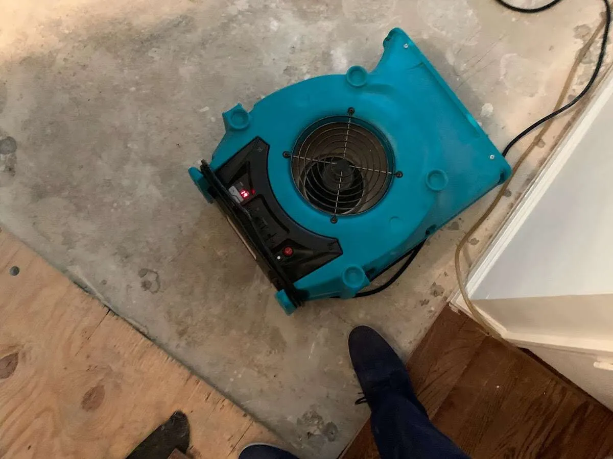 Air mover drying subfloor during Leak Detection & Repair in Lakewood Ranch